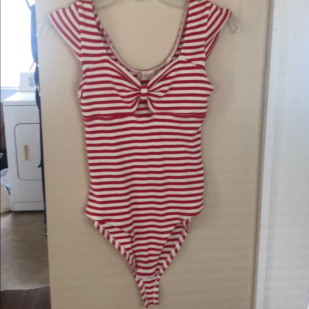 Red and white stripped body suit